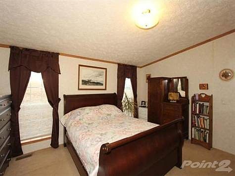 Your furniture will look lovely in this beautiful master suite.