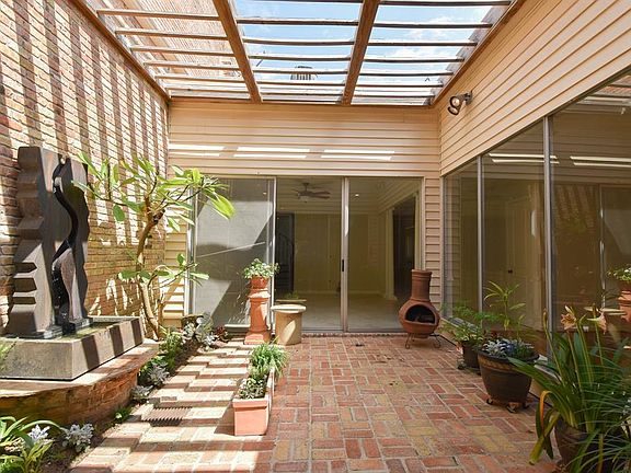 The second feature which the Sellers loved was their outdoor atrium with their amazing water art. The trickle of the flowing water brings such serenity and peace to all the rooms (media, living, dining) which overlook this special retreat.