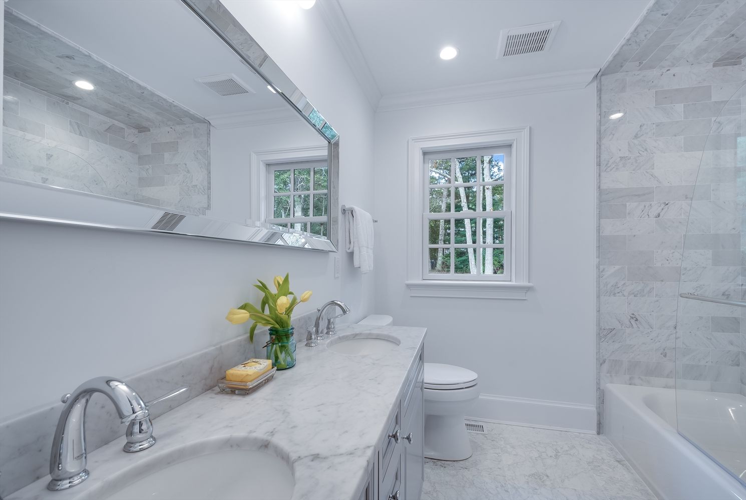 One of Four Full bathrooms