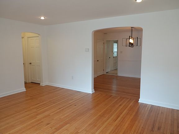 From living room, continue straight back into dining room and then kitchen. Or turn left for the two first floor bedrooms and full bath.