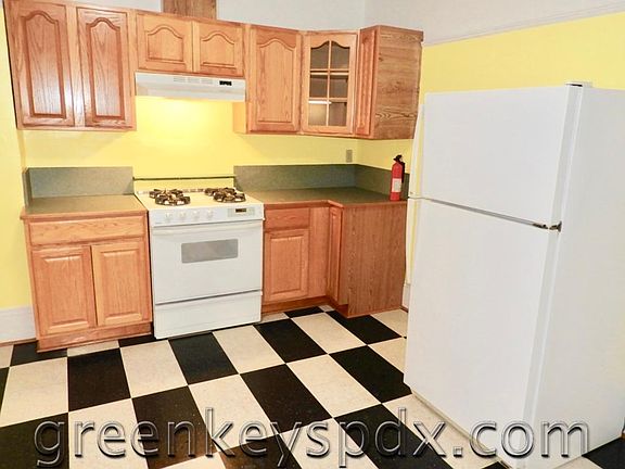 Kitchen has lots of cabinets
