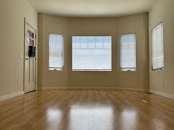 Living room with bay windows