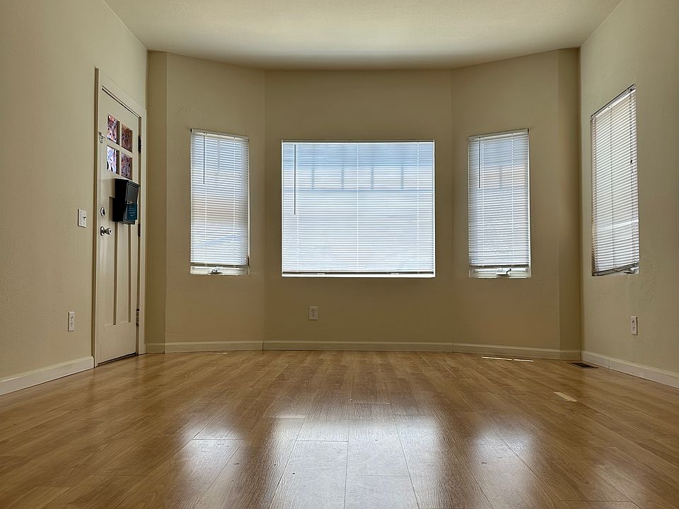 Living room with bay windows