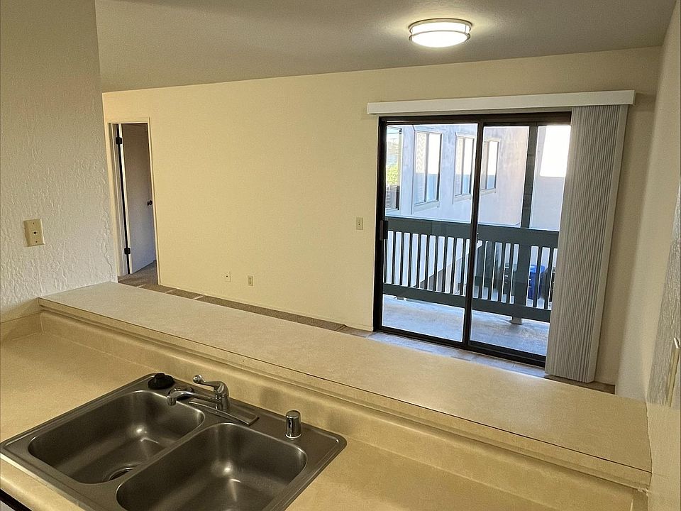 Kitchen facing the dining area and patio.
