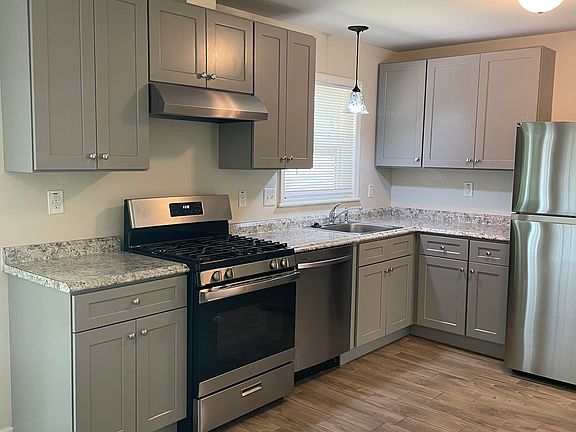 Updated kitchen with gas range, dishwasher and refrigerator. Ceramic tile floor. Pets welcome.