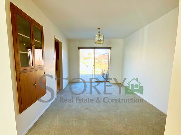 Dining room with patio doors to back yard,