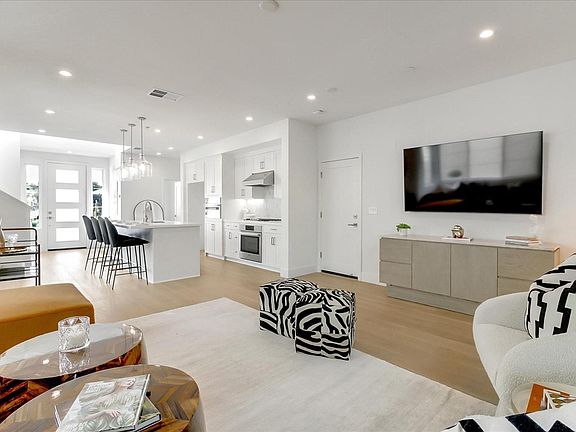 Bright sunny first floor with high ceilings and hardwood floors
Photos are of model home. Bungalow will be unfurnished