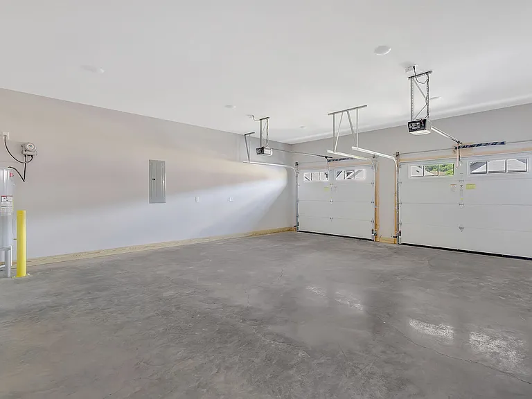 Private 2-car attached garage with direct entry