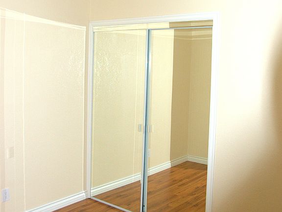 Bedroom with laminate floors