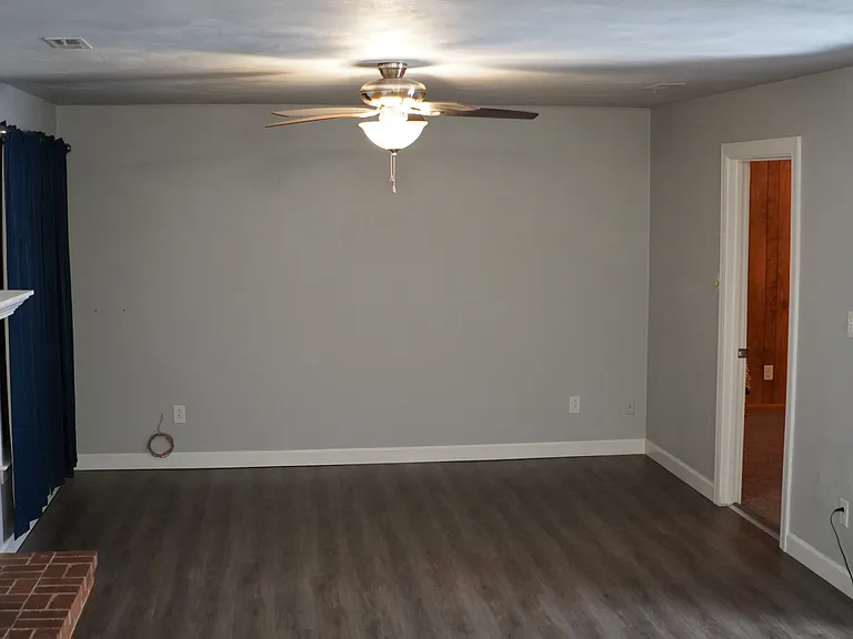 Fireplace, Den & Lower Bedroom Entry
