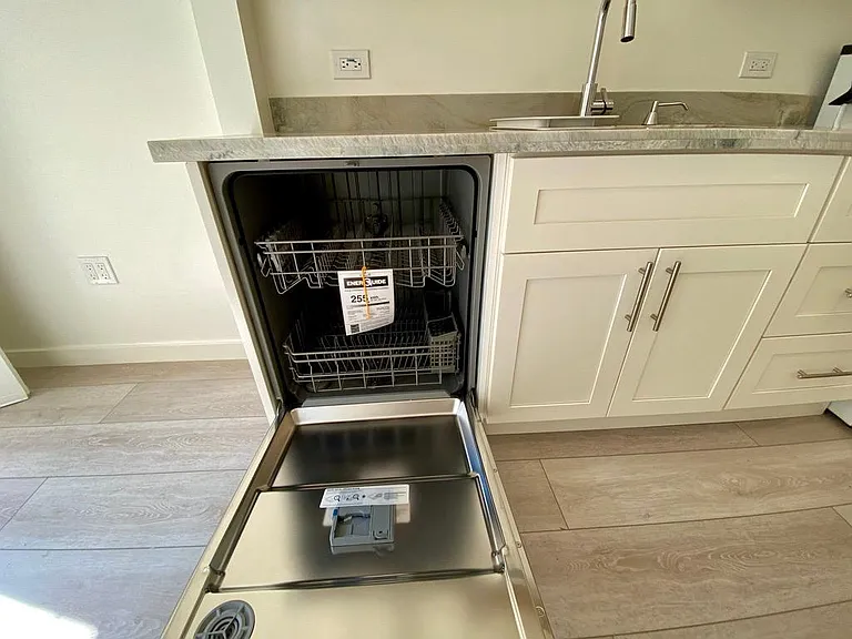 New appliances - D/W - New Stainless steel cook top and oven, microwave, etc.