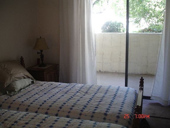 Bedroom / Balcony overlook pool.