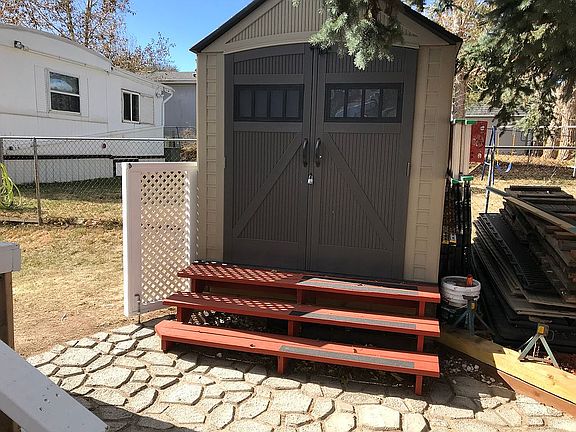 One of two sheds-back patio