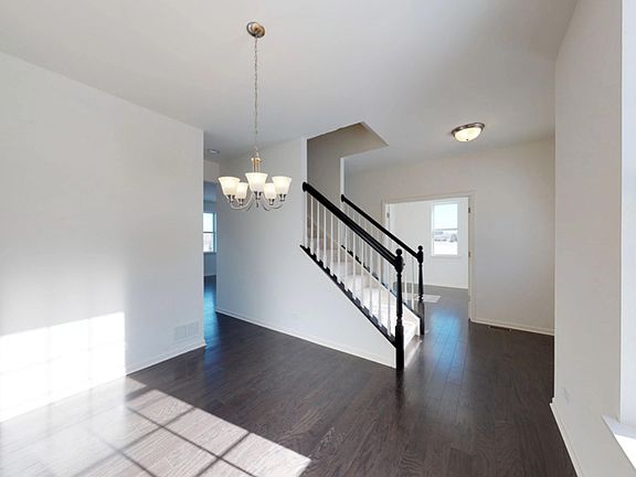 W240 N5684 Holly Court - Stratford II Under Construction - Dining Room and Staircase to Second Stor