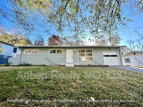 7009 NW Avalon St Photo 1