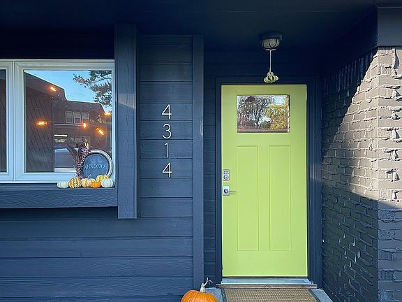 Fresh matte black paint & chartreuse accent door.