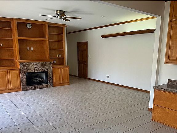 Den study w fireplace