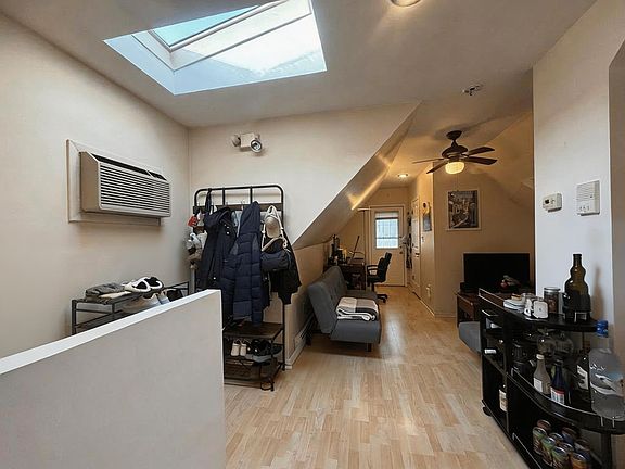 living room with skylight