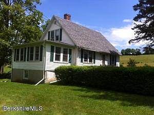 SIDE YARD WITH OPEN VIEW TO MEADOW