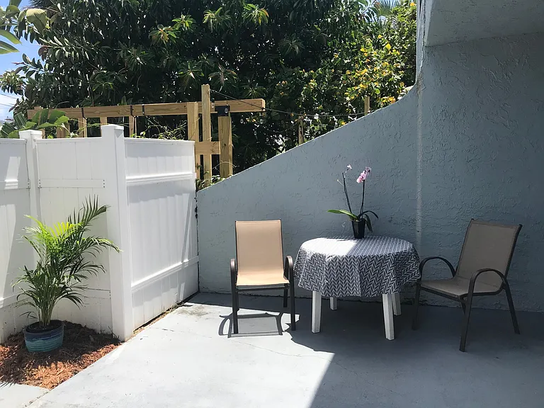 Outdoor patio with table and chairs