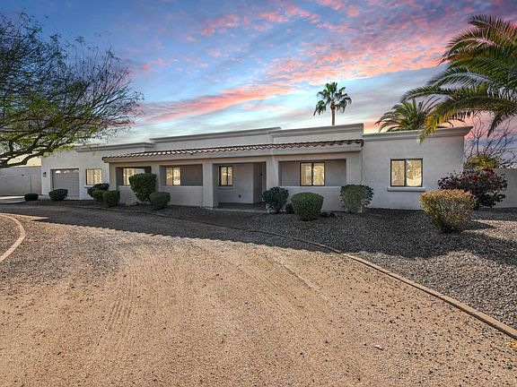 Large driveway with exterior landscape lighting. Property sits at the end of a quiet cul de sac