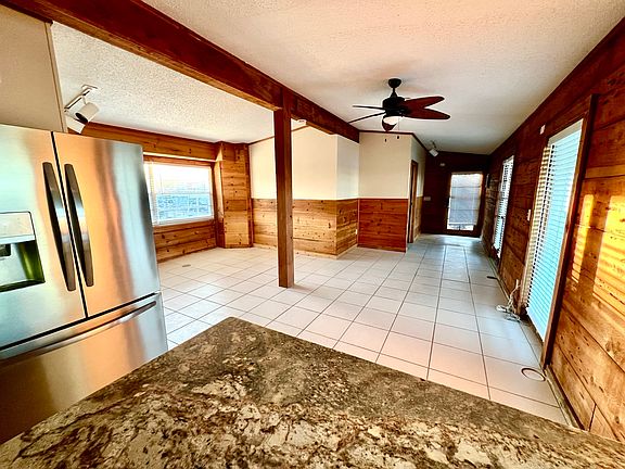 Open concept kitchen/living room/eat in bar