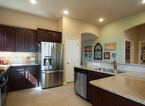 Not to miss: 1404 Rimstone Drive in Whitestone Oaks. Beautiful gourmet kitchen with granite, stainle