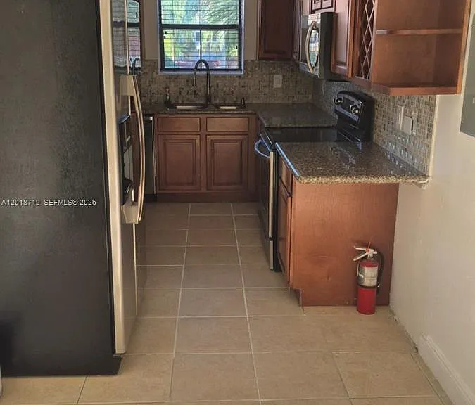 15581 SW 104th Ter #221 — Photo 3