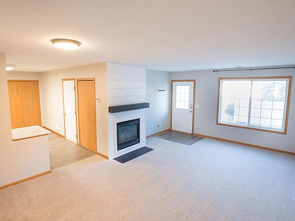 Large main level living room *TV mount to be installed above FP prior to move-in*