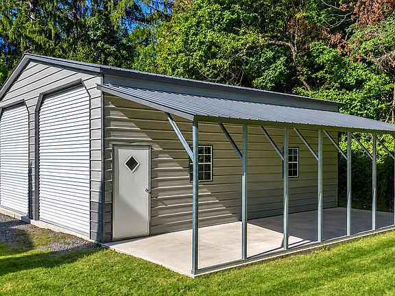 30'x40' garage with oversized doors. Perfect for storing boats or RVs.