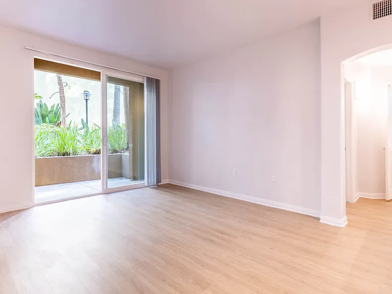 Living Room with Balcony and Hard Surface Flooring