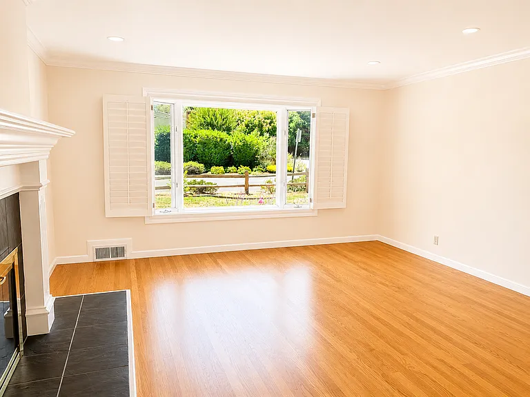 Living room with bay window facing cul-de-sac
