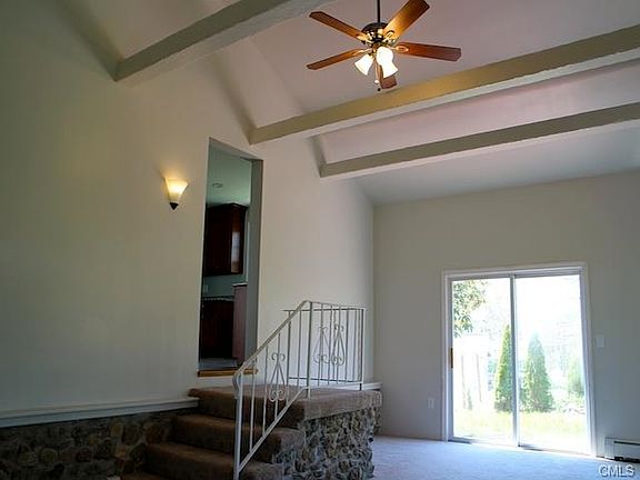 Family Room off the kitchen w/ sliders to the yard