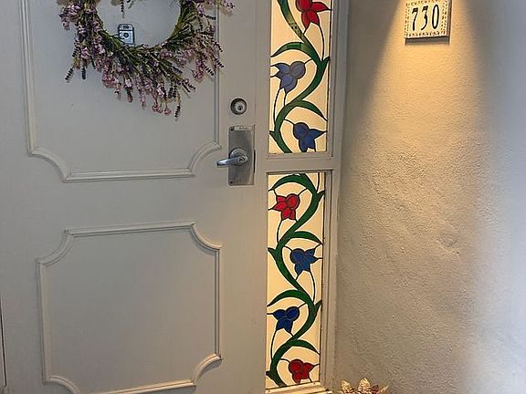 Front door w/ stained glass