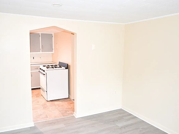 Living room, looking into the kitchen
