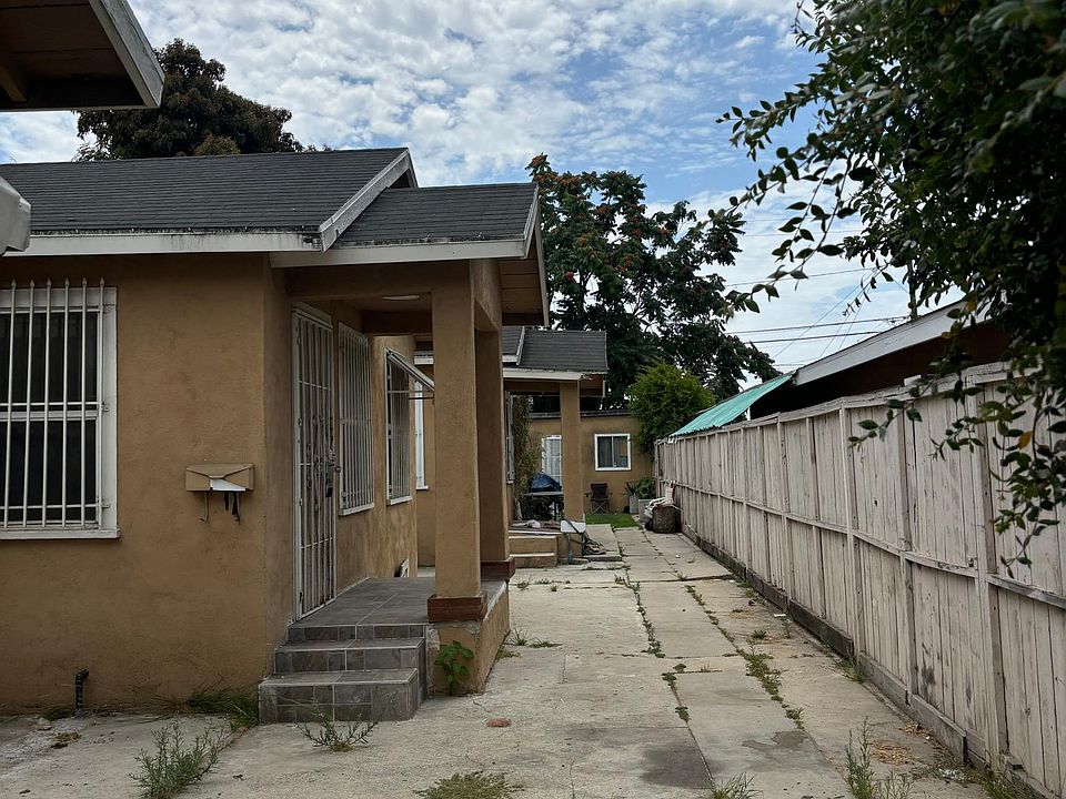 Middle unit and parking spot in driveway.