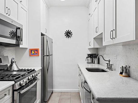 5th image of 60 E 8th St APT 14A