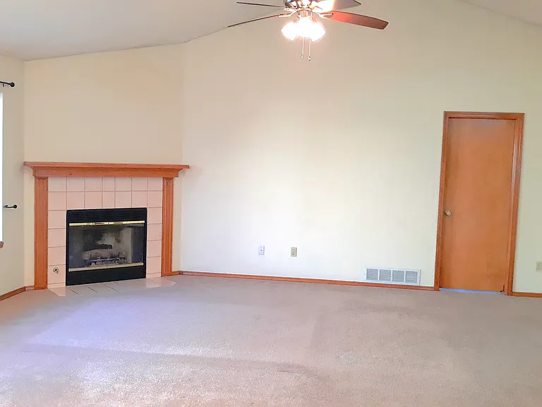 Family room with fireplace and bay window