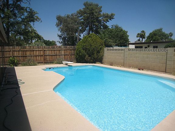 Big backyard with alot of decking around pool