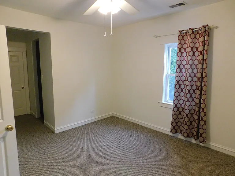 2nd bedroom with walk in closet and access to the 2nd bathroom
