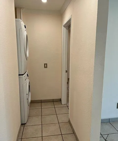 Hallway between primary bedrooms