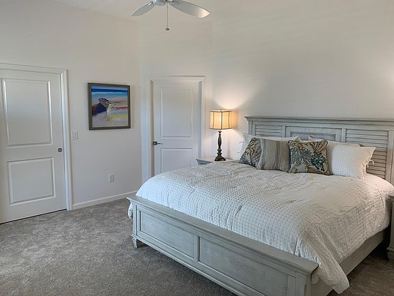 Master Bedroom with Walk-in Closet and King-size Bed which is available with the furnished option.
