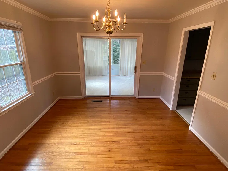Dining Room: Opens to Sunroom. Kitchen on the right.