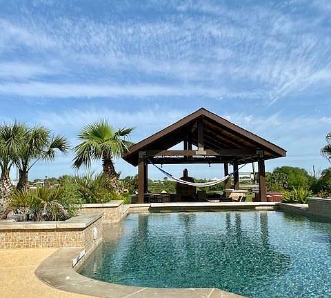 outdoor pool area / with kitchen / hot tub and firepit