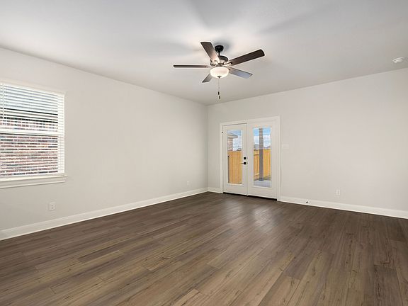 Expansive living room with all of the space you need for movie nights with friends.