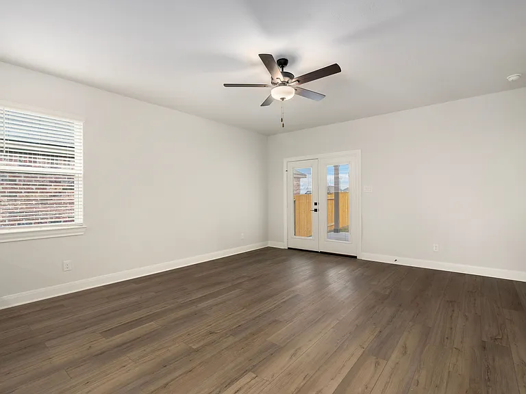 Double doors in the family room lead to the backyard.