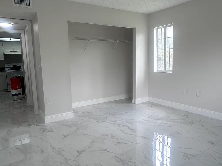 5011 Wiles Rd #207 — Photo 9