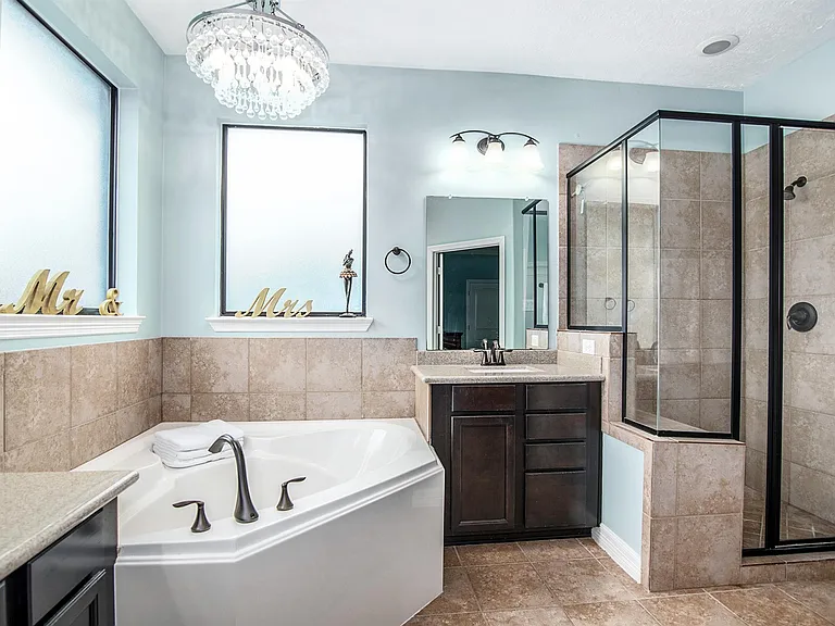 Well-appointed primary bath designed for comfort and convenience