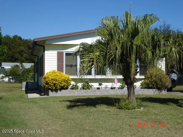 1078 Royal Palm Dr, Barefoot Bay, FL 32976