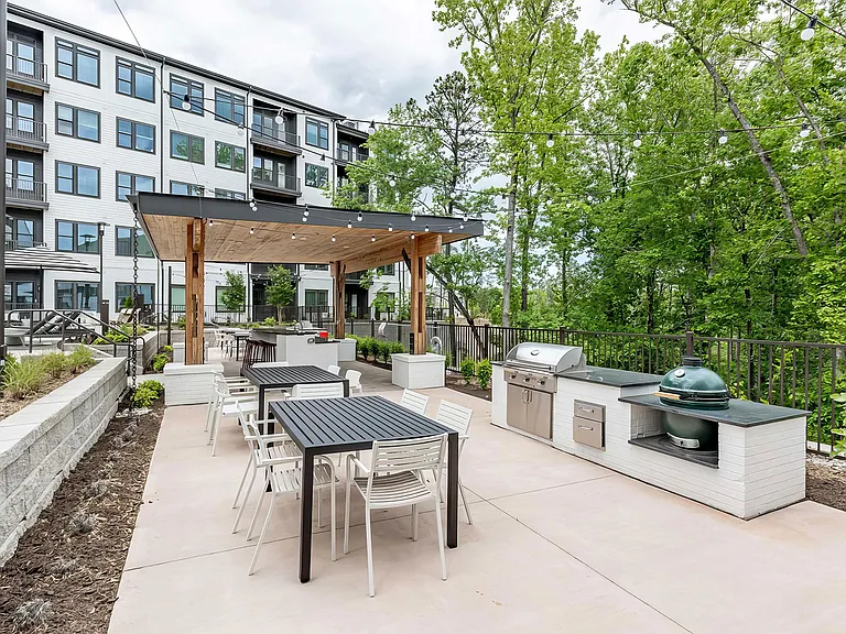 Fun and beautiful outdoor kitchen and seating areas with standard and ceramic grills